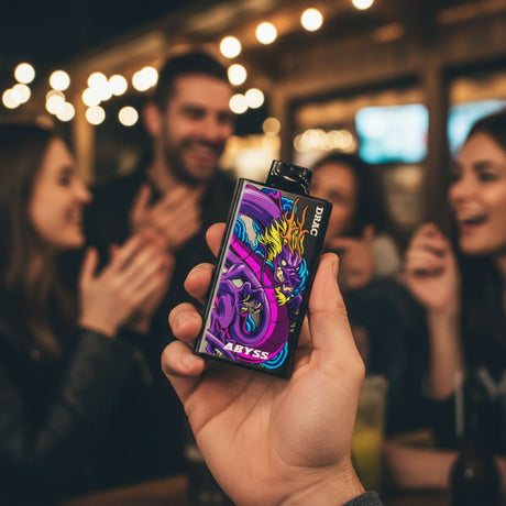 Person holding Nasty Bar Dragon 25k disposable vape in a nightlife setting