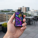 Person holding Nasty Bar Dragon 25k disposable vape on a rooftop
