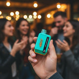 Person holding a Nasty Bar 9k in a social setting with friends